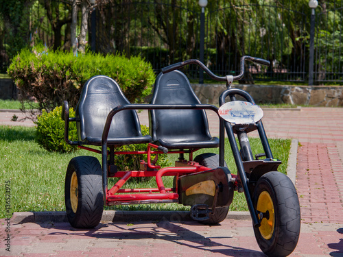 velomobile tourist standing in the park