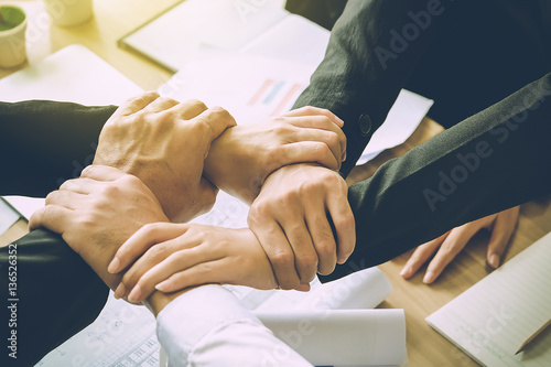 The Business Confederate hands together. The teamwork and unity