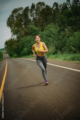 Woman Running on the road