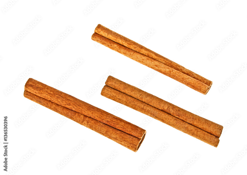 Cinnamon sticks on white background, top view