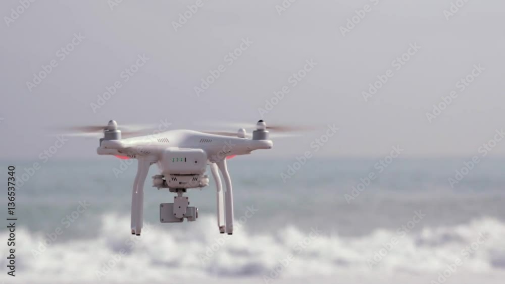 Drone flying over wavy sea Drone flying over wavy sea