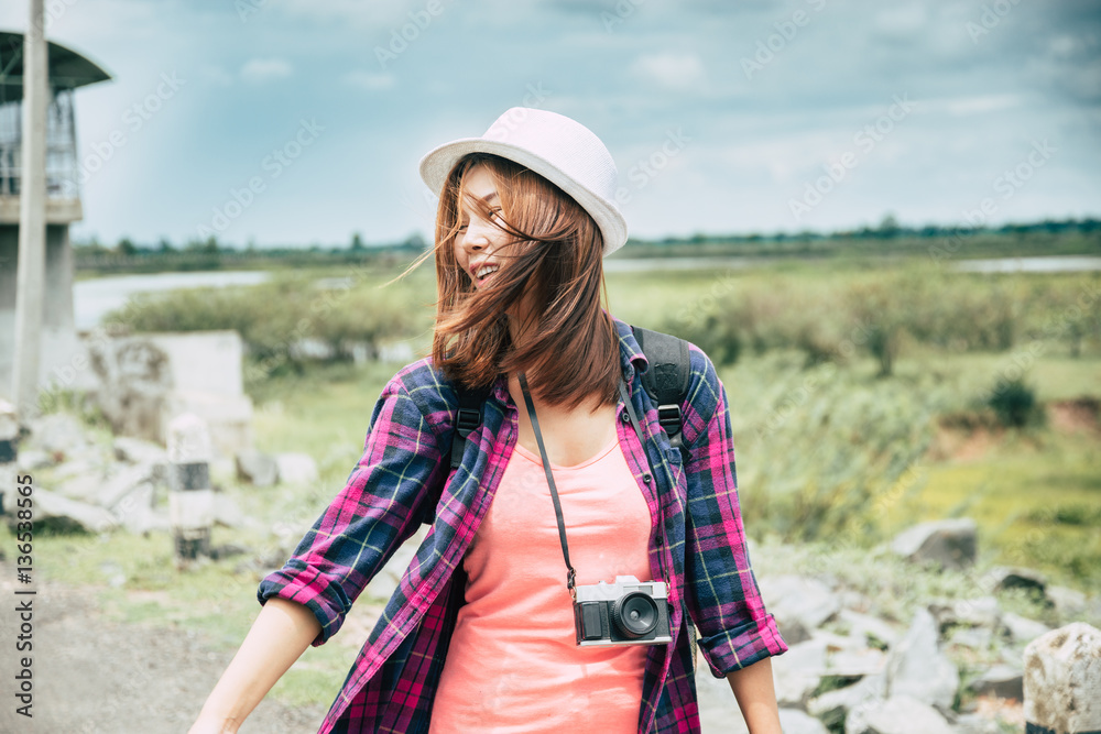 Traveler happy asian  woman with old photo camera ,Traveling Holiday Photography Concept.