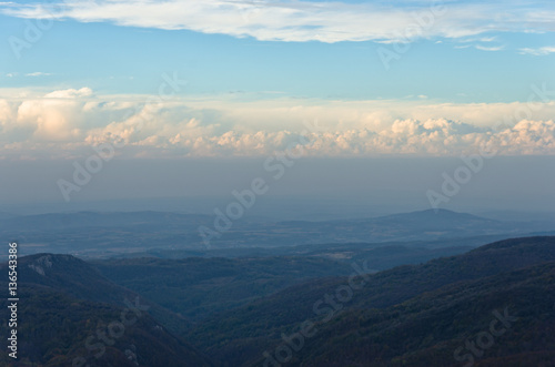Homolje mountains landscape and cloudscape on a late afternoon sunny autumn day with a few clouds, east Serbia