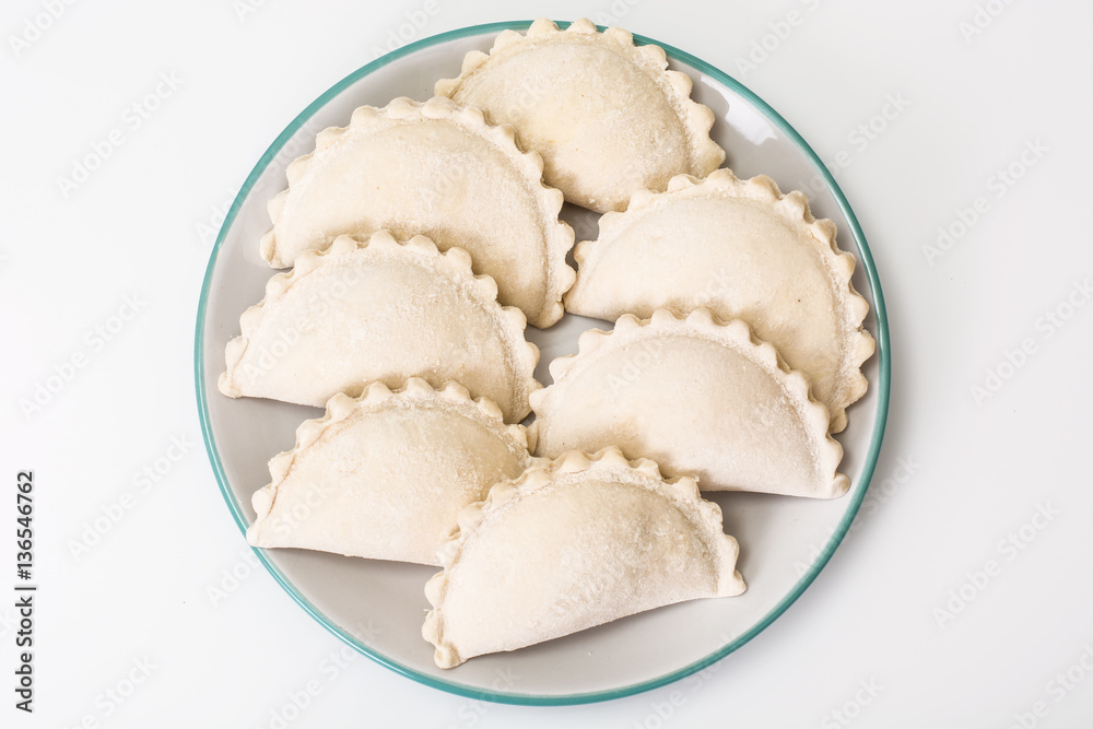 Dumplings raw on a plate Dumplings raw on a plate