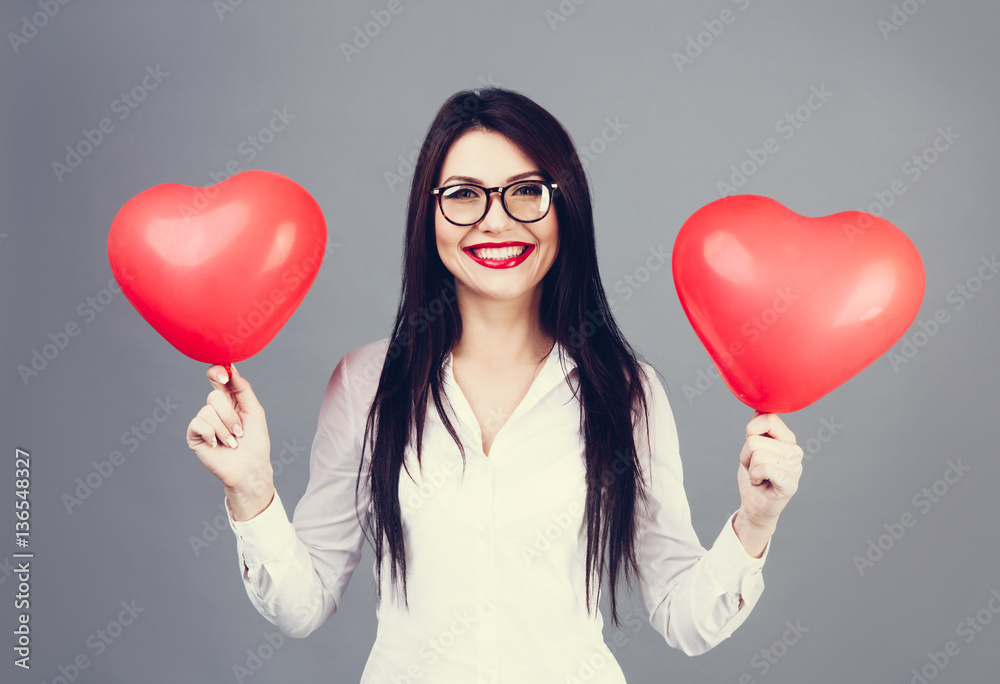 Funny girl in glasses with two heart on hands. Valentine day con Funny girl in glasses with two heart on hands. Valentine day con