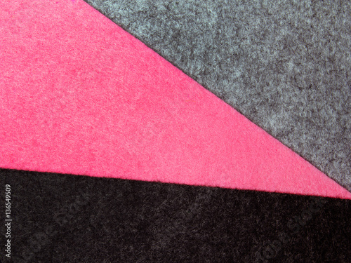 Colorful felt texture for background with copy space. Black, gray and pink color composition © czarny_bez
