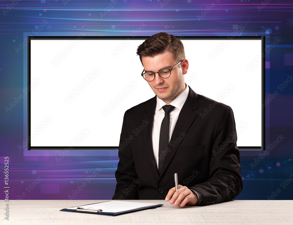 Television program host with big copy screen in his back Television program host with big copy screen in his back