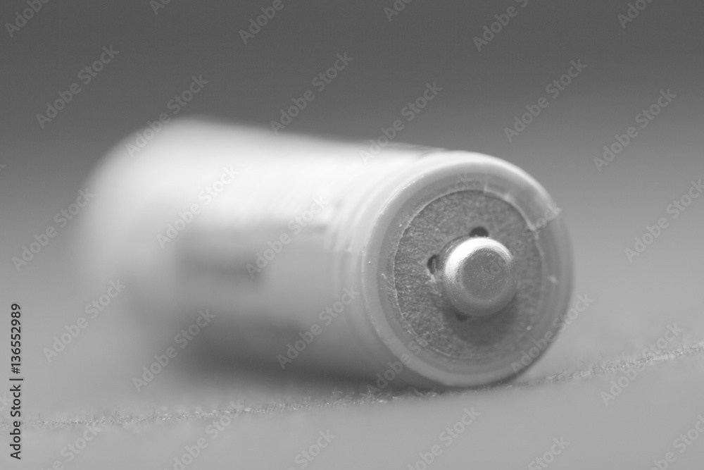 battery on a black background. Macro battery on a black background. Macro