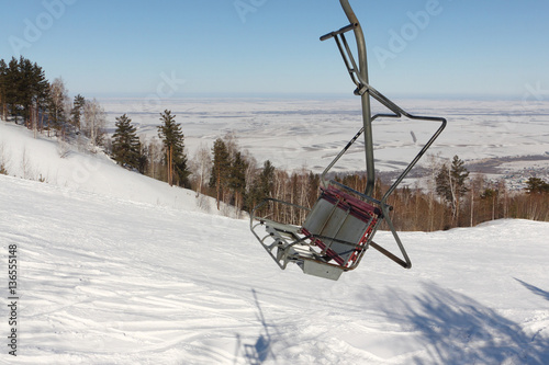 Ropeway on a mountain slope in the winter, a fragment , Altai, Russia