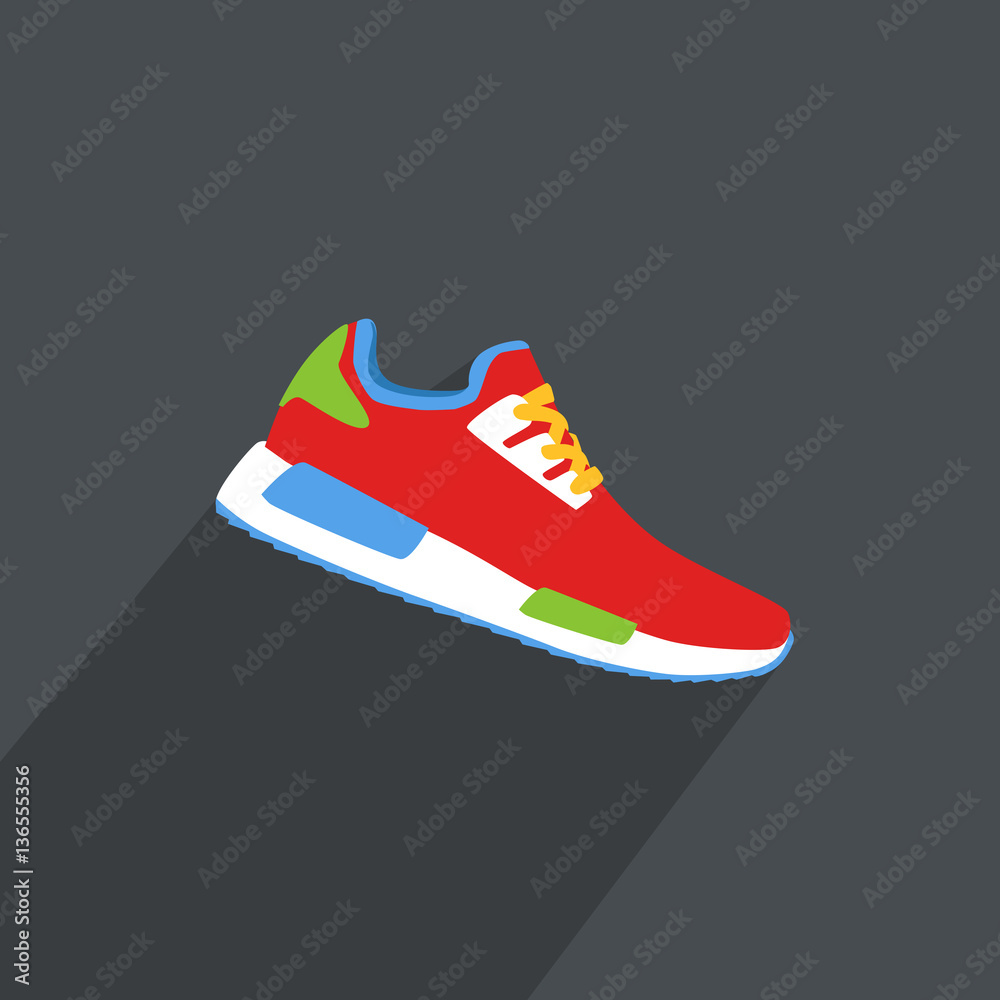 Stylish red sneaker for training on grey background Stylish red sneaker for training on grey background