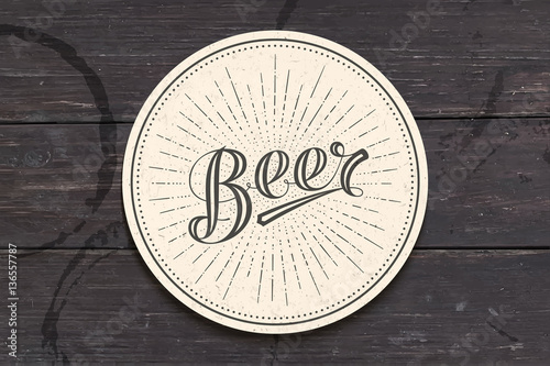 Coaster for beer with hand-drawn lettering Beer. Monochrome vintage drawing for bar, pub and beer themes. White circle for placing beer mug and bottle over it with lettering. Vector Illustration photo