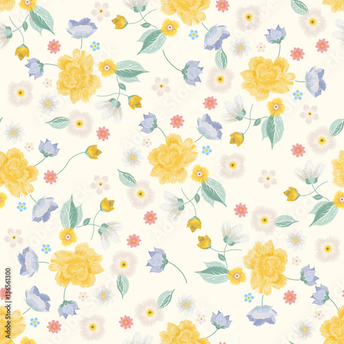 Embroidery colorful simplified ethnic floral seamless pattern. Vector traditional folk roses flowers ornament on beige background for design. © natagalitskaia