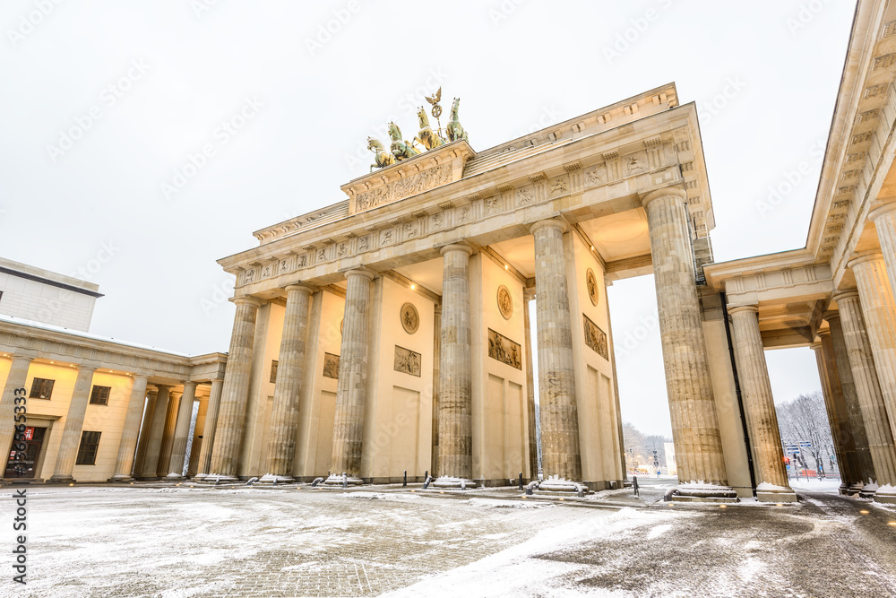 Brandenburg gate (Brandenburger Tor) in snow, Berlin, Germany, Europe