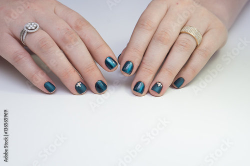 Beautiful hands and natural nails  ideal clean manicure. Decorated with stylish elements