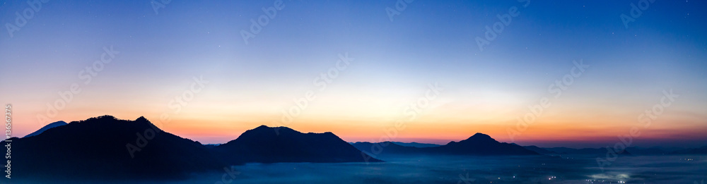 Fototapeta premium Mountain valley during sunrise. Natural summer landscape