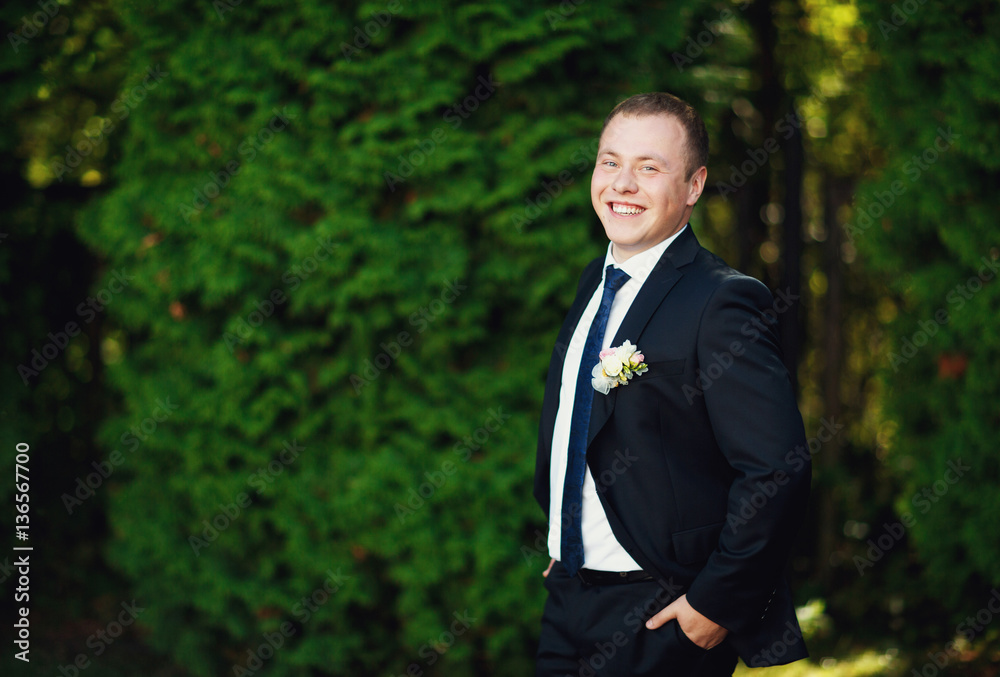 Portrait of happy handsome groom Portrait of happy handsome groom