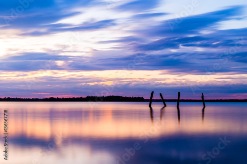 minimalist landscape.Colorful sky and the sea reflected in sunse © zoneteen