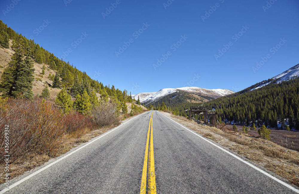 Scenic mountain road in autumn, travel concept picture, Colorado, USA.