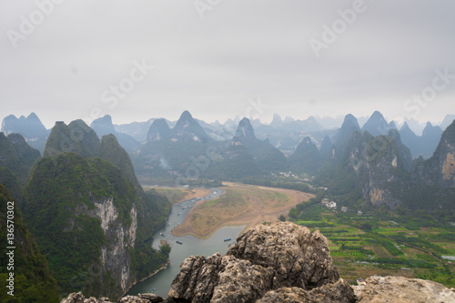 фотографія view from the top of hill - karst mountain and river  landscape in Xingping, Yangsho, China