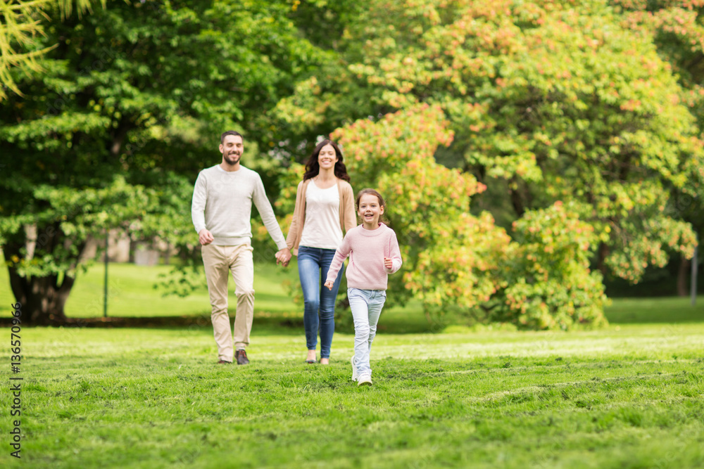 happy family walking in summer park and having fun happy family walking in summer park and having fun