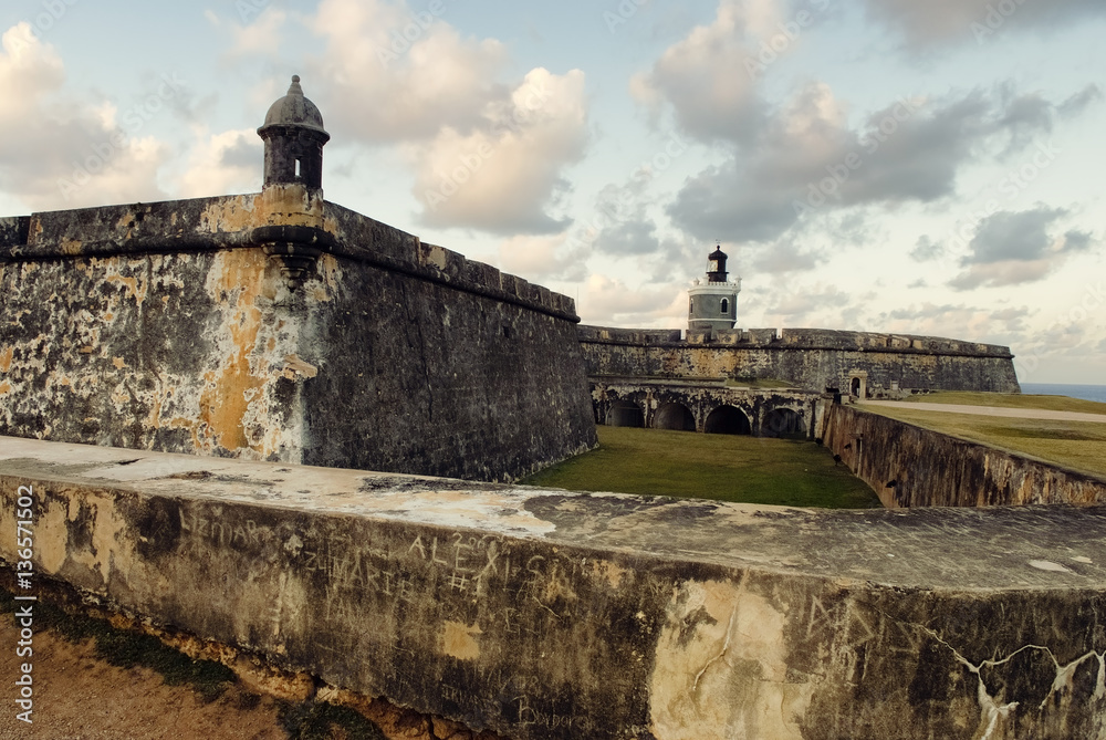 View of El Morro Fort with sunset sky, San Juan, Puerto Rico