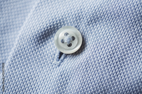 close up of blue shirt button photo