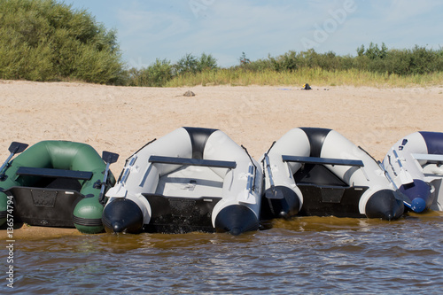 Rubberboats at beach. Watersport. Lake Friesland Netherlands. photo