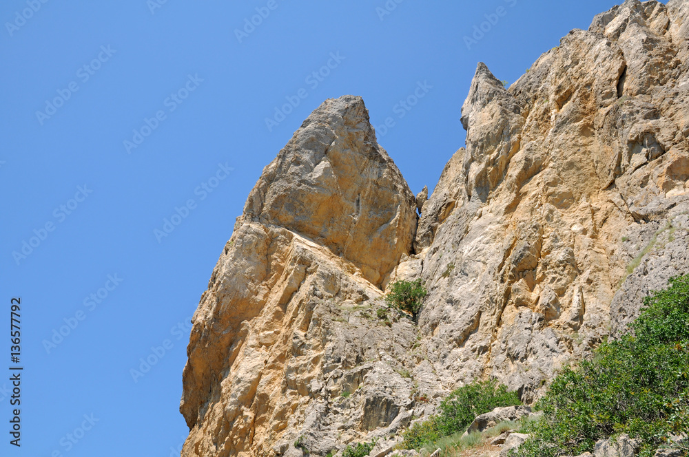 Rocky ridge against a blue sky