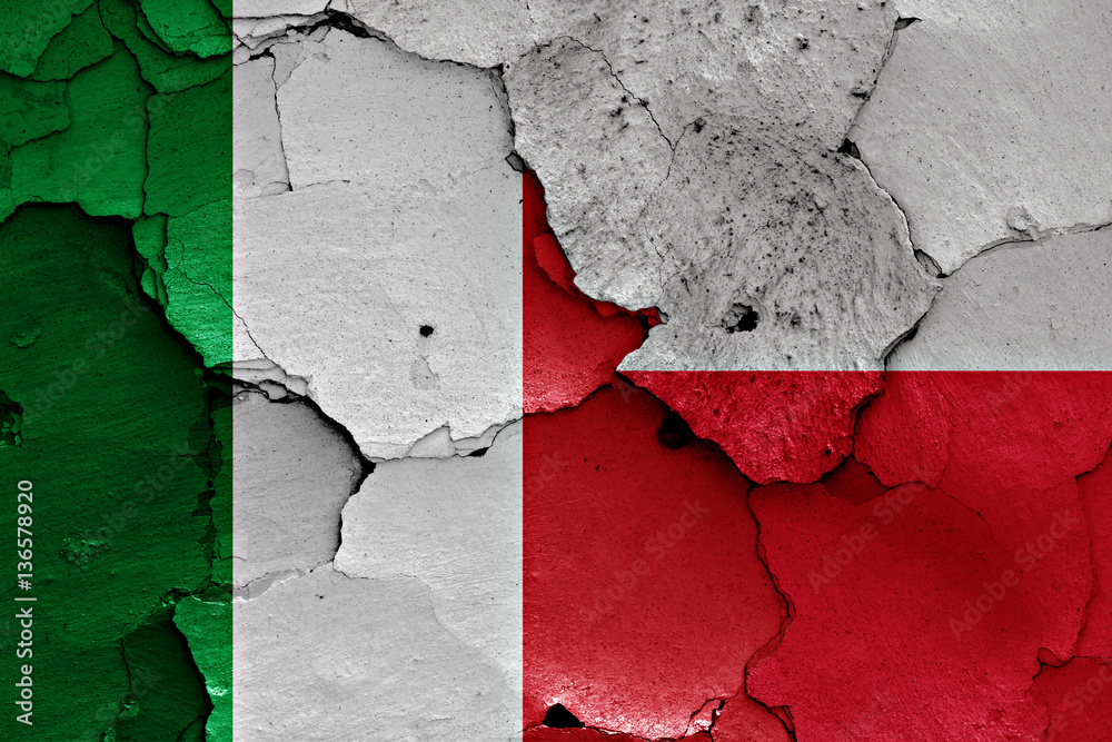 flags of Italy and Poland painted on cracked wall
