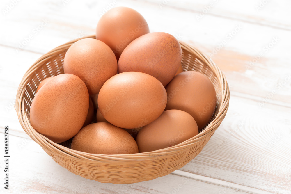Brown Chicken Eggs in Wicker Tray Brown Chicken Eggs in Wicker Tray