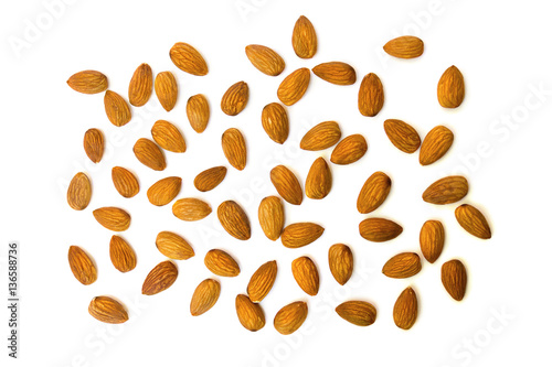 Almonds on white background. Top view, flat lay