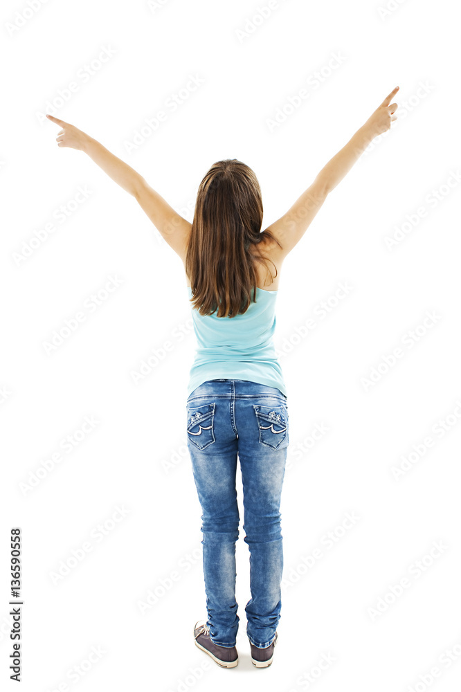 Back view of little girl points at wall with both hands. Rear view. Isolated on white background Back view of little girl points at wall with both hands. Rear view. Isolated on white background