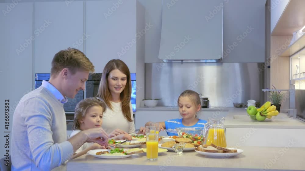 Family with kids in kitchen Family with kids in kitchen