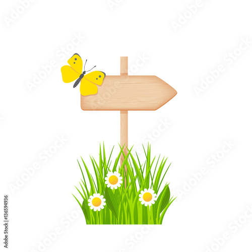 Wooden arrow signboard on a pole at the spring lawn