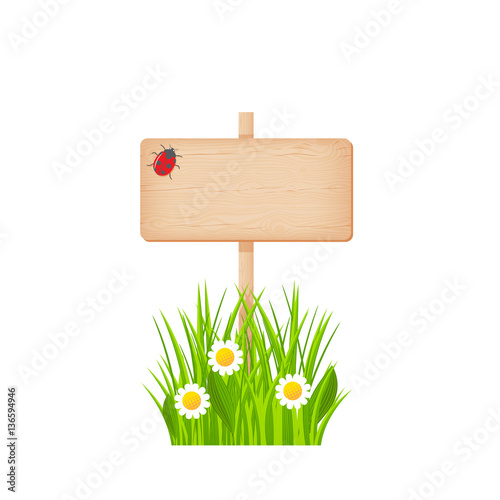 Wooden rectangular signboard on a pole at the summer lawn