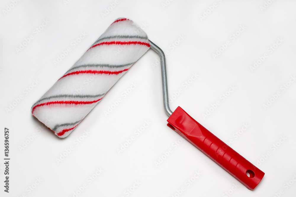Fototapeta premium Paint roller on white background