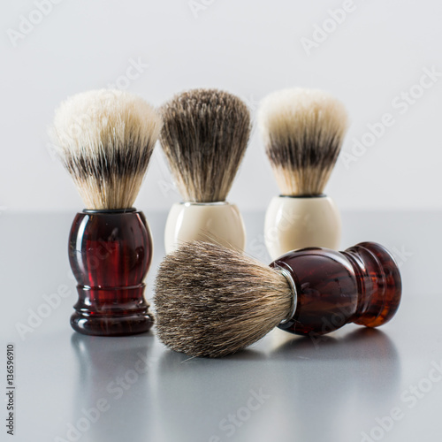 Shaving brush isolated on grey background.