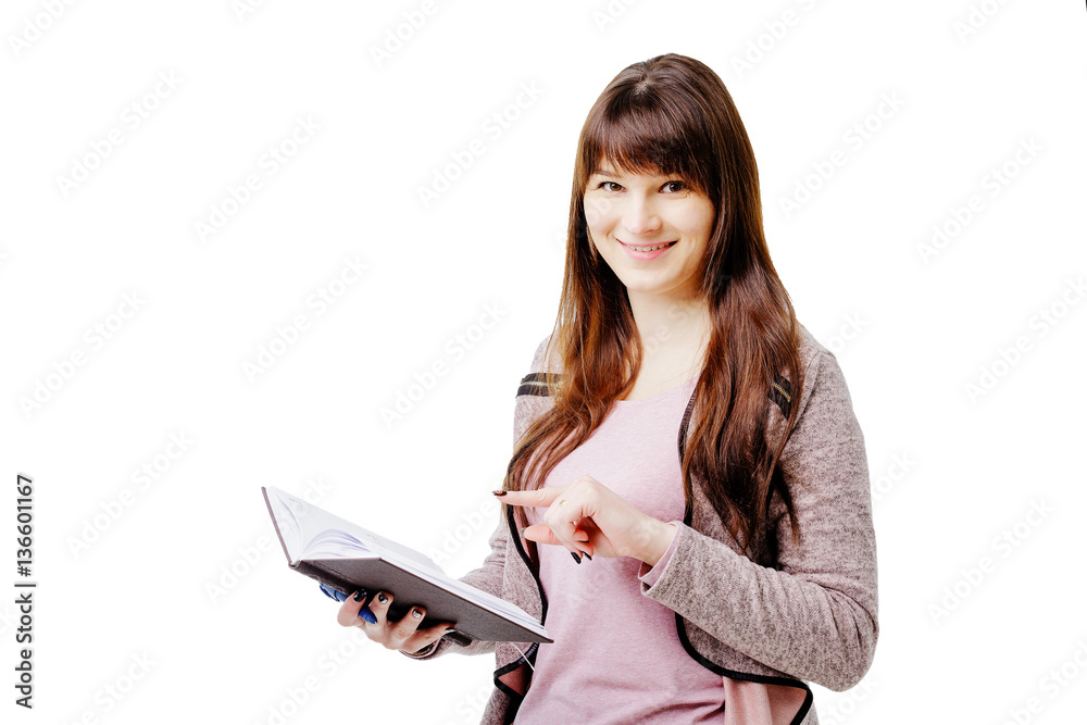 young brunette woman holding a notebook and pen on white isolated background young brunette woman holding a notebook and pen on white isolated background