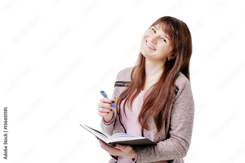 young brunette woman holding a notebook and pen on white isolated background young brunette woman holding a notebook and pen on white isolated background