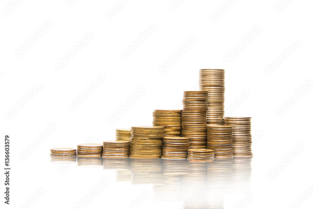 Golden coins stacked in piles Golden coins stacked in piles