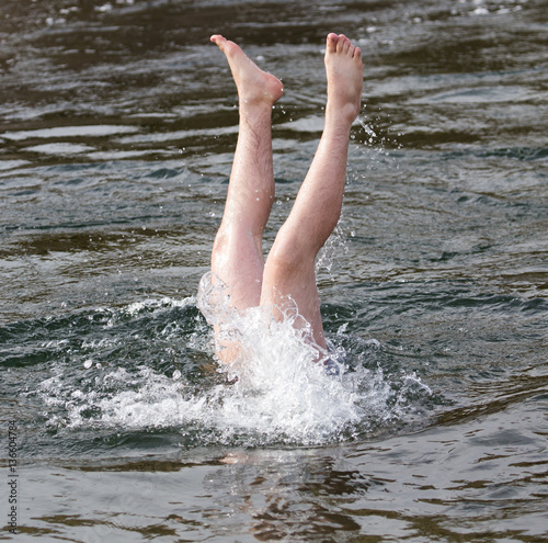 male legs from under water