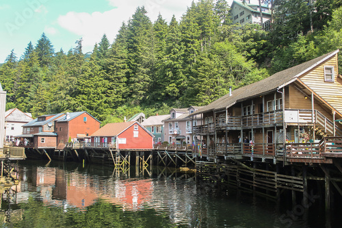 Suspended houses above a small river from Skagway, Alaska
