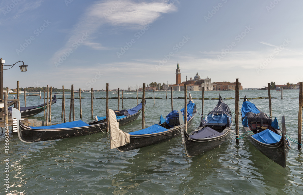 Venice gondolas in front of San Giorgio Maggiore island, Italy.