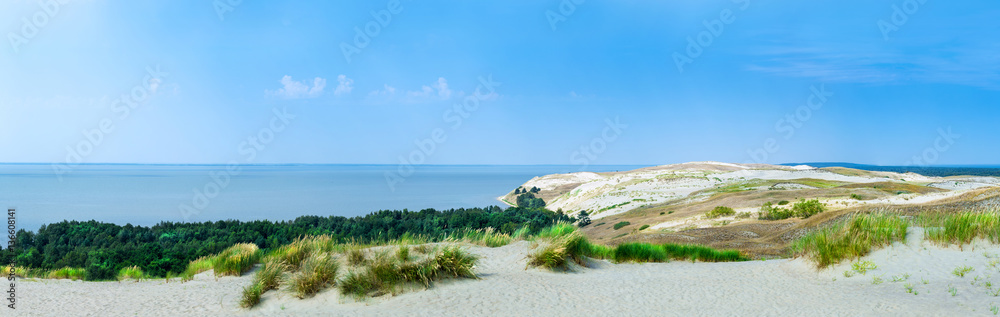 Panoramic view on dunes of the Curonian spit. This place to the highest drifting sand dunes in Europe. Nida, Lithuania. Panoramic view on dunes of the Curonian spit. This place to the highest drifting sand dunes in Europe. Nida, Lithuania.