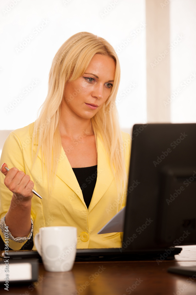 The boss - Business woman works in the office with computer - ha The boss - Business woman works in the office with computer - ha
