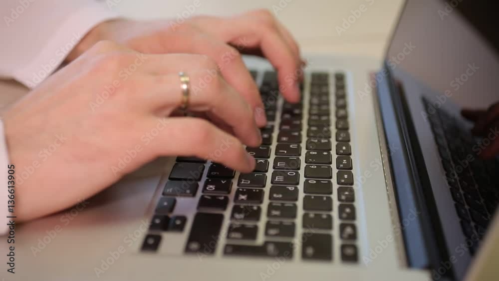 Doctor working in his office at his laptop. He publishes appointment of treatment for their patients. Doctor working in his office at his laptop. He publishes appointment of treatment for their patients.