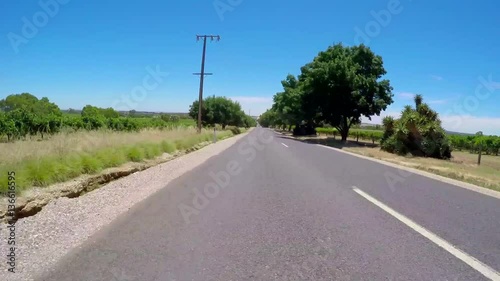 Vehicle POV, driving along Krondorf Road through the Barossa Valley, South Australia, real time. photo