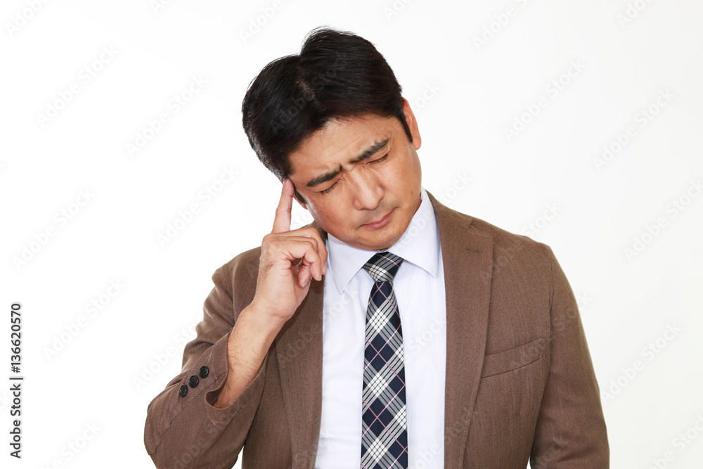 苦悩するビジネスマン
