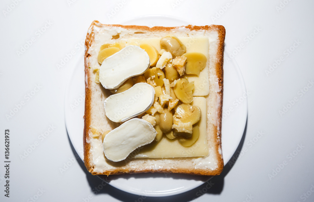 Sandwich with two kinds of cheese and mushrooms for breakfast Sandwich with two kinds of cheese and mushrooms for breakfast