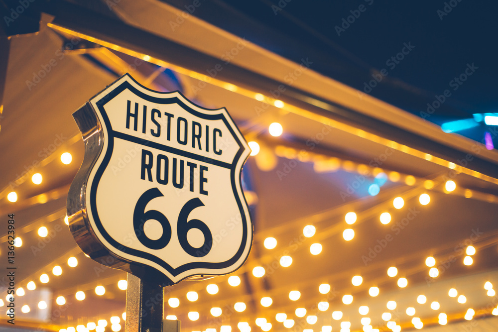 Historic Route 66 sign in California with decoration lights on the  background Stock-Foto | Adobe Stock